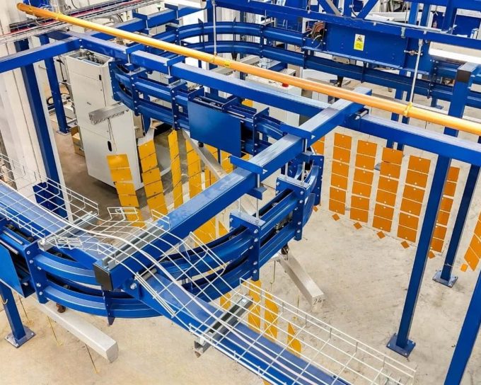 Overhead conveyor system for industrial powder coating line in Midlands facility