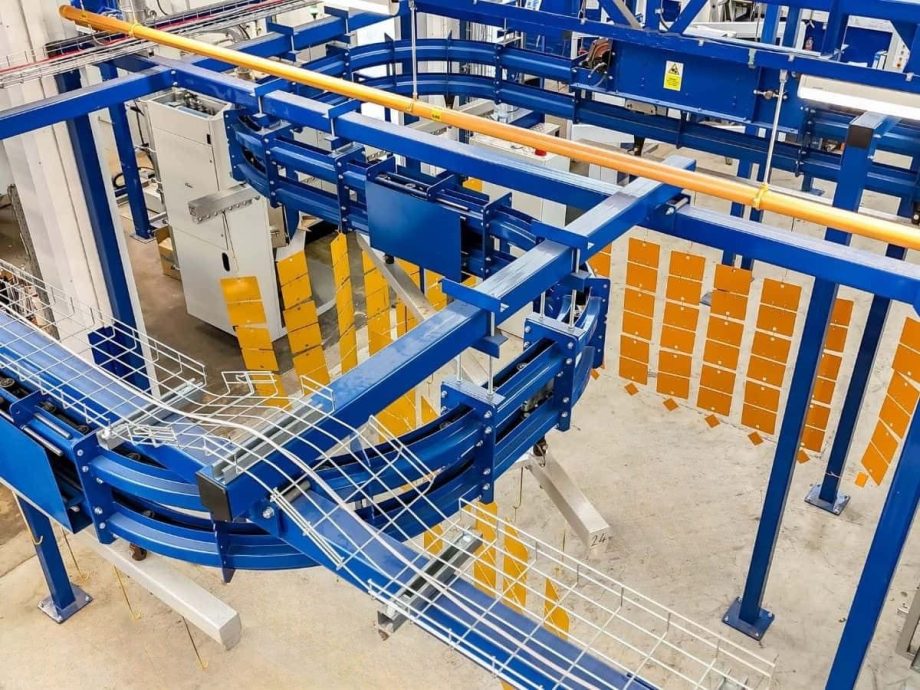 Overhead conveyor system for industrial powder coating line in Midlands facility