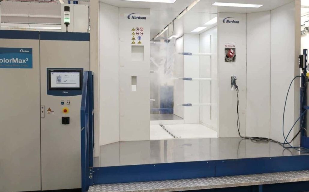 Automated Nordson powder coating booth in Leicestershire industrial finishing facility