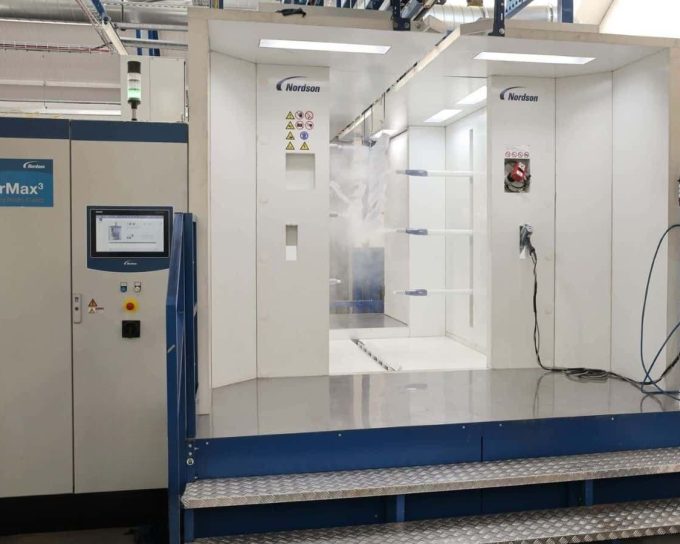 Automated Nordson powder coating booth in Leicestershire industrial finishing facility